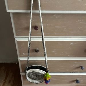 Woven crossbody with tassel decor